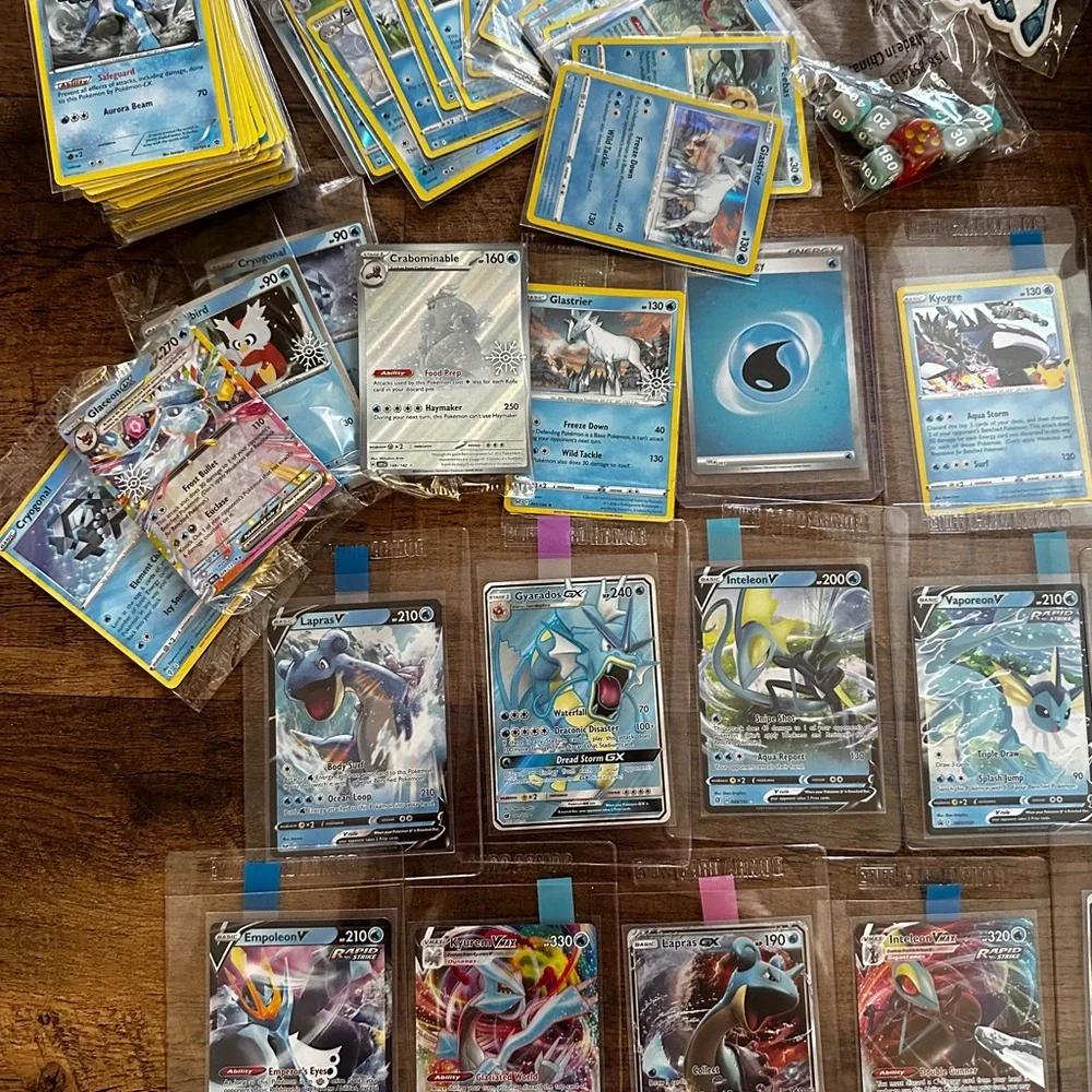 Pokemon Card Collection with Tins and Accessories 25 card Mystery Tin plus bonus